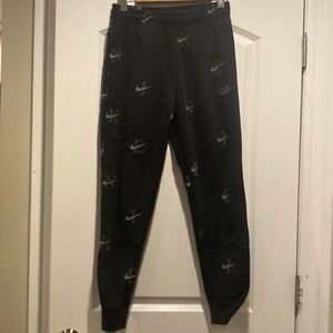 Nike Club Fleece all over print sweatpants in black